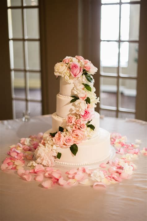 White Buttercream Cake With Cascading Blush And Ivory Flowers Floral