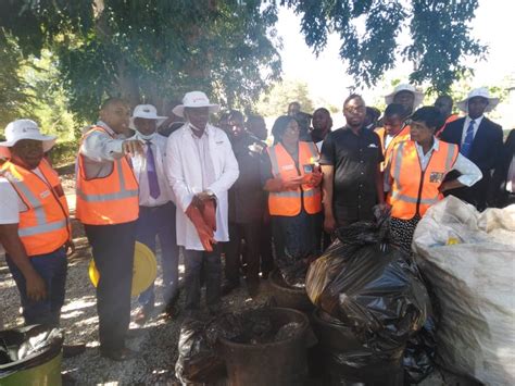 In Pics Clean Up Campaign Across Zimbabwe Three Men On A Boat