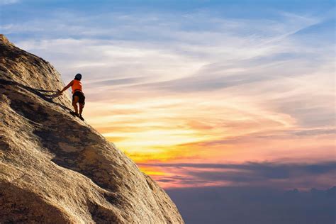 Person Climbing On Mountain · Free Stock Photo