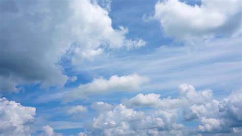 Summer Clouds Fly Across A Royal Blue Sky Hd 1080p Timelapse Stock