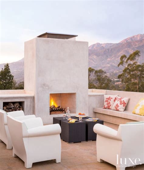 Modern Outdoor Terrace With White Concrete Fireplace