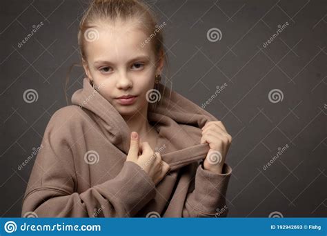 Hild Girl With Long Hair Gathered In A Bun Stock Image Image Of