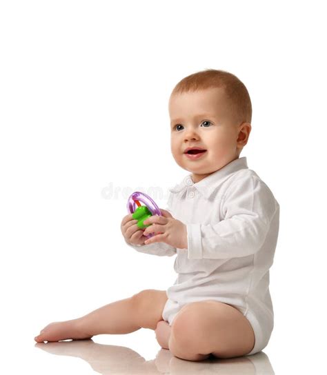Infant Child Boy Toddler Sitting With Plastic Toy Isolated Stock Image