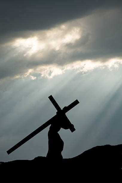 Jesus Christ Carrying Cross Pictures Images And Stock Photos Istock