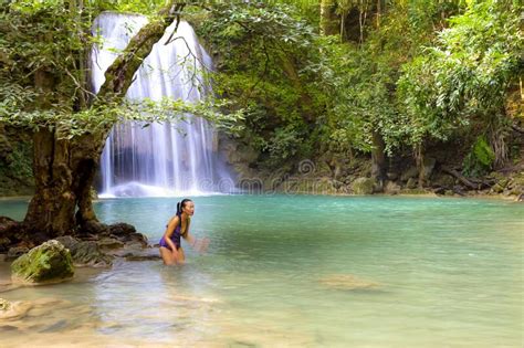 Woman With Swimsuit Stand Enjoy At Erawan Waterfall And Natural Stock