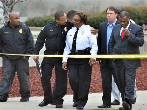 officer suspect dead at police hq in mississippi