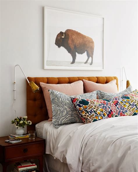 The simplest, easiest, and the most common primary bedroom wall art is wallpaper. 10 Ways to Decorate Above your Bed - Domestic Imperfection