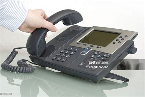 Making A Call Woman Picking Up Phone Receiver Stock Photo High Res