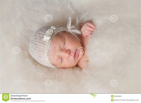 Newborn Baby Girl Wearing A White Knitted Bonnet Stock Photo Image Of
