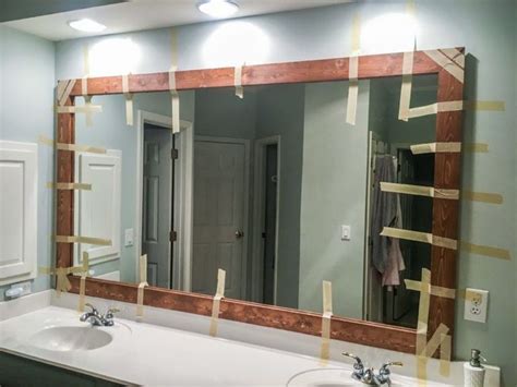 How To Diy Upgrade Your Bathroom Mirror With A Stained Wood Frame Building Our Rez Bathroom