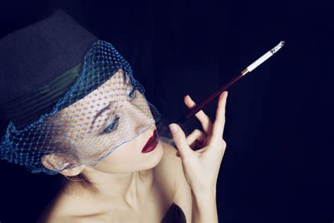 Royalty Free Smoking Women Cigarette Cigarette Holder Pictures Images