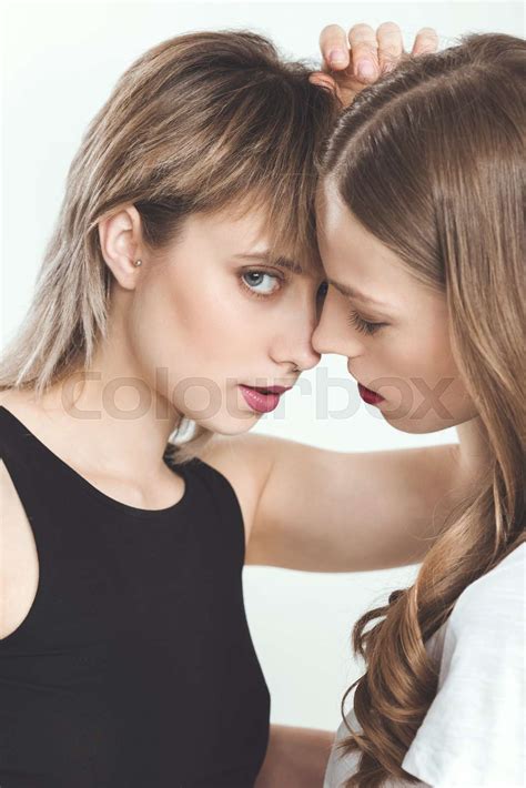 Close Up Portrait Of Beautiful Babe Lesbian Couple Posing Together Isolated On White Stock