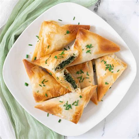 Vegan Spanakopita Triangles Are Made With Crisp Buttery Phyllo Dough