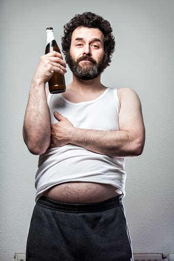 Bearded Beer Man Posing With His Bottle Stock Photo Download Image