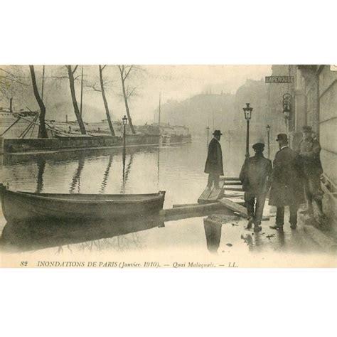 Est une submersion temporaire, naturelle ou artificielle, d'un espace par de l'eau liquide. INONDATION ET CRUE PARIS 1910. Quai Malaquais Laperouse