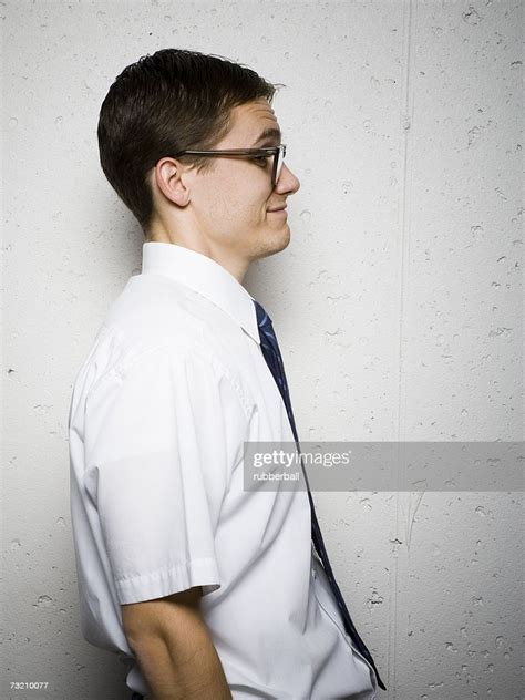 Side Profile Of Geeky Businessman With Glasses High-Res Stock Photo 
