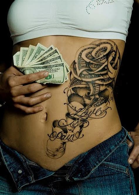 Feminine tattoo on ribs - Tattoos Book - 65.000 Tattoos Designs