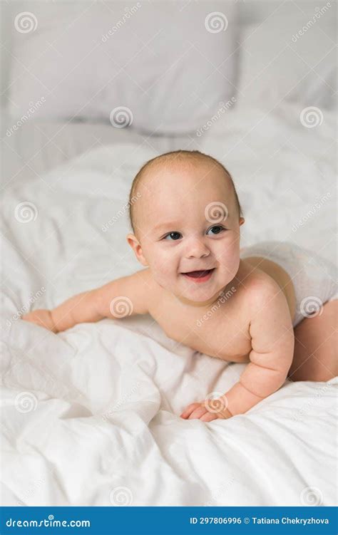 Happy Baby Lying On Bed Laughing Generation Alpha And Gen Alpha Stock
