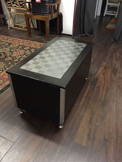 Lift the flanked top, aided by hidden hinges, to reveal a secret storage area that is ideal for holding magazines, remote controls and more, keeping clutter at bay. Simple DIY coffee table with hinged top for blanket ...