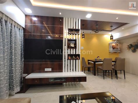 The original design of the living room was typical of the 1980s aesthetic: Living Room Dining Area Design 2BHK Apartment Thane Mumbai CivilLane dot com | Hall interior ...
