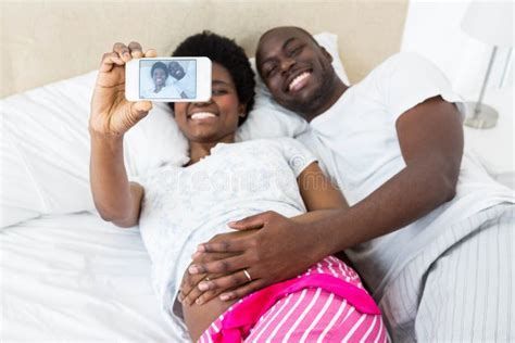 Happy Couple Touching Pregnant Belly Taking Selfie Stock Image Image
