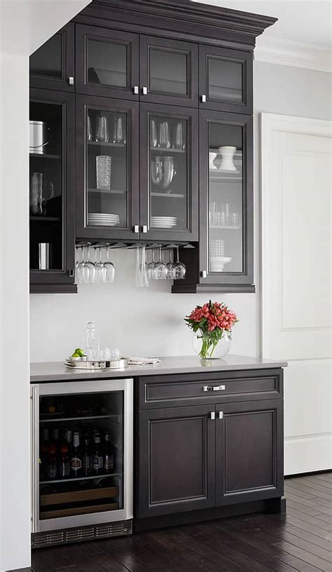 This sturdy piece can store eight bottles of wine and the ability to hang many glasses. 43 Insanely Cool Basement Bar Ideas for Your Home ...