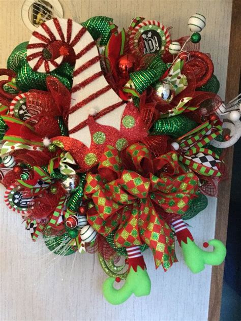 This Adorable Wreath Is Done In Green And Red Mesh Its Just Too Cute With Lots Of Ribbons And A