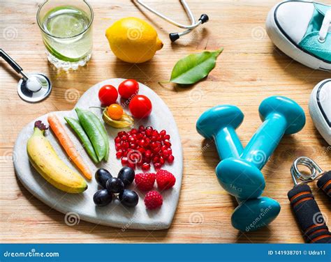 Healthy Lifestyle Concept With Food In Heart Diet Fitness Sport And