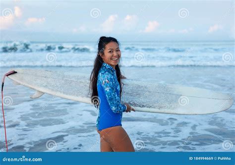 Beautiful Surfer Girl Surfing Woman With Surfboard Smiling Brunette
