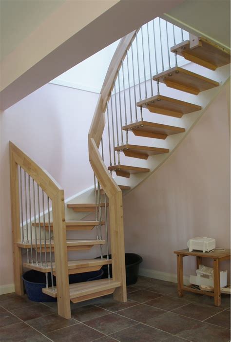 Simple Design Ideas Of Small Space Staircase With Brown Wooden Treads