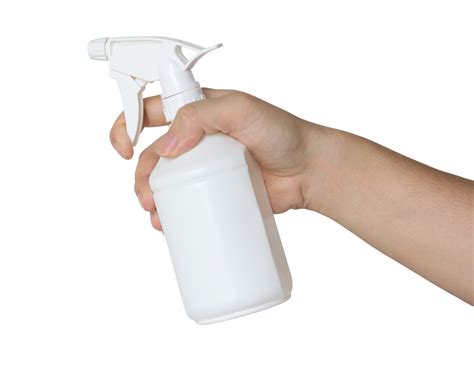 Hand Holding A Spray Bottle Isolated With Clipping Path For Mockup