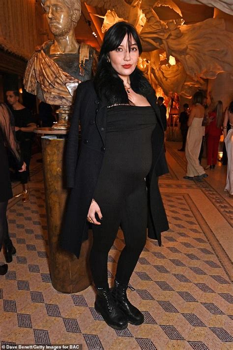 Pregnant Daisy Lowe Shows Off Her Bump In A Strapless Black Catsuit As She Enjoys Glitzy