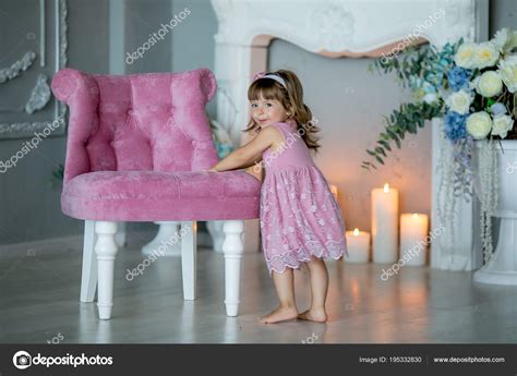 Beautiful Little Girl Posing Studio Pink Chair Stock Photo By