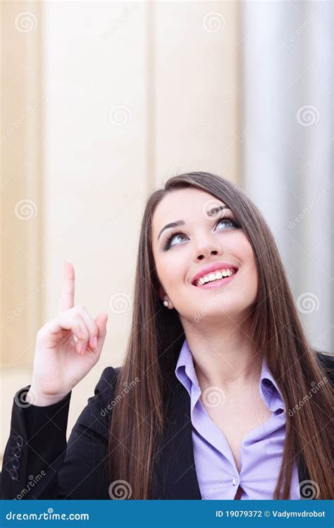 Happy Businesswoman In Office Pointing Up Stock Photo Image Of Bright