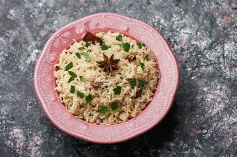 Jeera Rice In Pink Plate At Dark Bacgkround Stock Photo Image Of