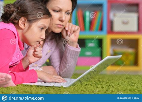 Mother With Her Little Daughter Using Laptop Stock Image Image Of
