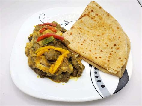 Curry Goat Roti Bone In Taste Seduction Jamaican Cuisine