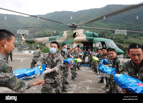 Chinese Pla Peoples Liberation Army Soldiers Unload Relief Goods From