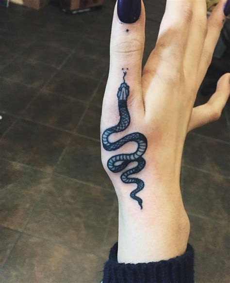 25 Amazing Small Snake Tattoo Ideas And Designs Hand Tattoos For Women