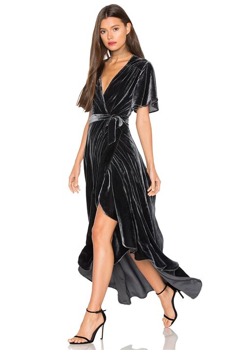 This design includes gorgeous pleats and a wintery cape detail that. #REVOLVE | Winter wedding outfits, Wedding guest outfit ...