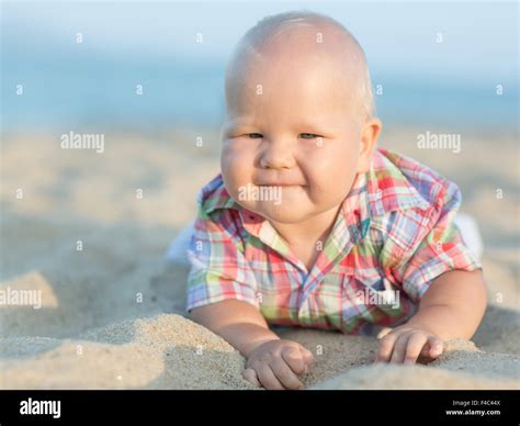 Baby On The Beach Stock Photo Alamy