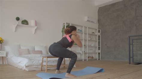 Rear View Of Lovely Fit African American Woman In Sportswear With