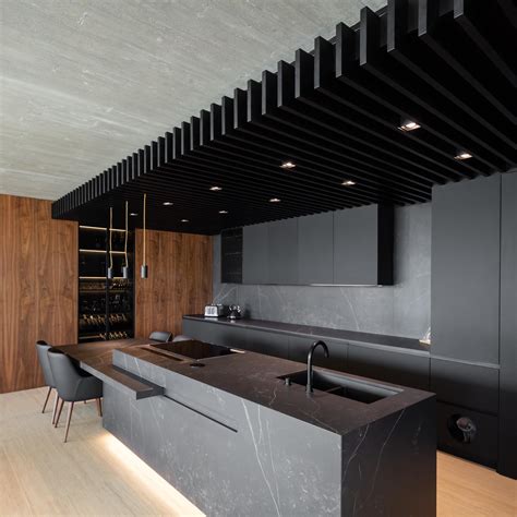 A Matte Black Kitchen Makes A Strong Statement Inside This Home