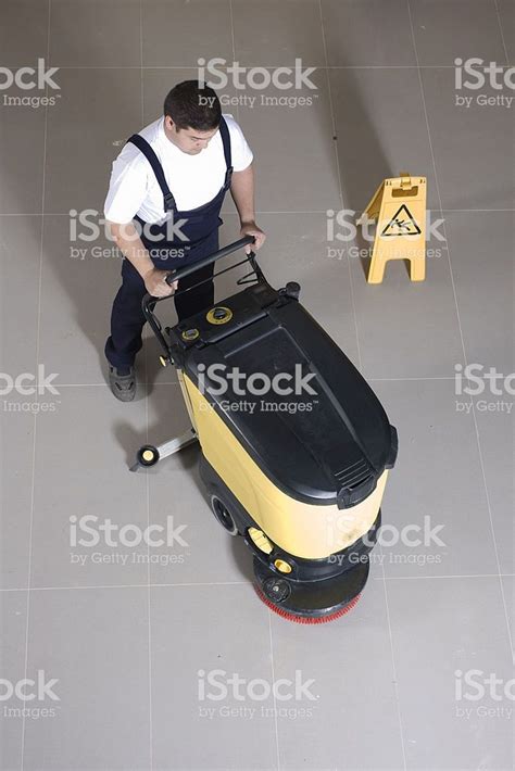 A Worker Is Cleaning The Floor With Machine Asal Cleaning