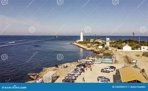 Seascape With Beautiful White Lighthouse On Cape Tarkhankut Crimea