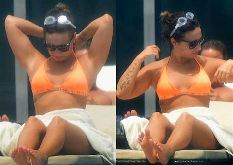 Lovely Two Piece Demi Lovato Relaxes In An Orange Bikini As She Soaks