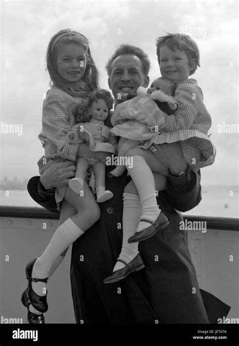 television personality bruce forsyth with his two daughters debbie l 6 and julie 3 who