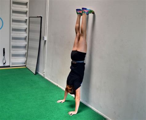 They help strengthen your upper body and core. Handstand Wall Hold