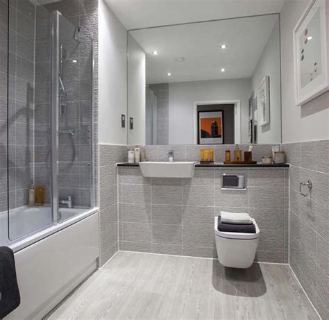 Half-tiled main bathroom of a Taylor Wimpey Gosford. | Bathroom