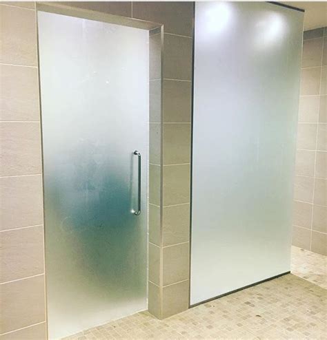 Frosted Sliding Door To The Ensuite Shown With A D Handle Along With A Frosted Shower Screen
